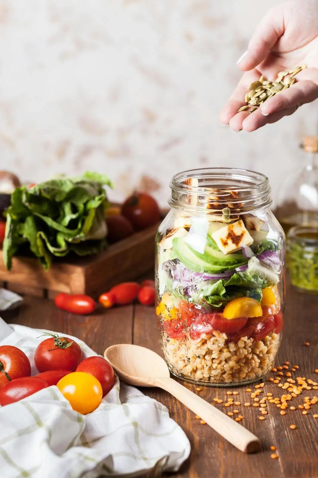 Healthy Ingredients on a Chopping Board: Avocado, Eggs, and Fresh Vegetables